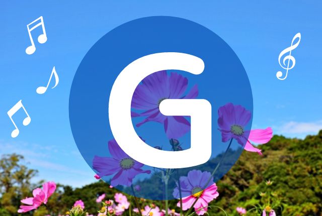 花畑の背景にアルファベットのGが書かれています。