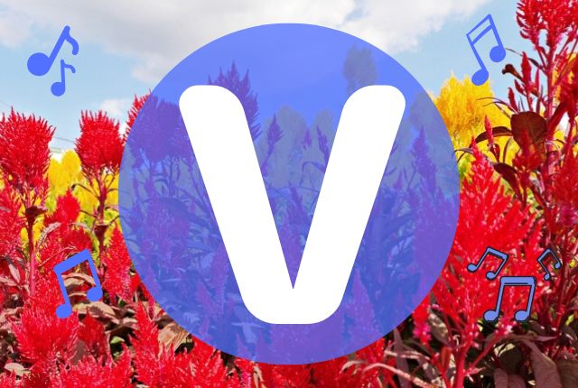 花畑の背景にアルファベットのVが書かれています。